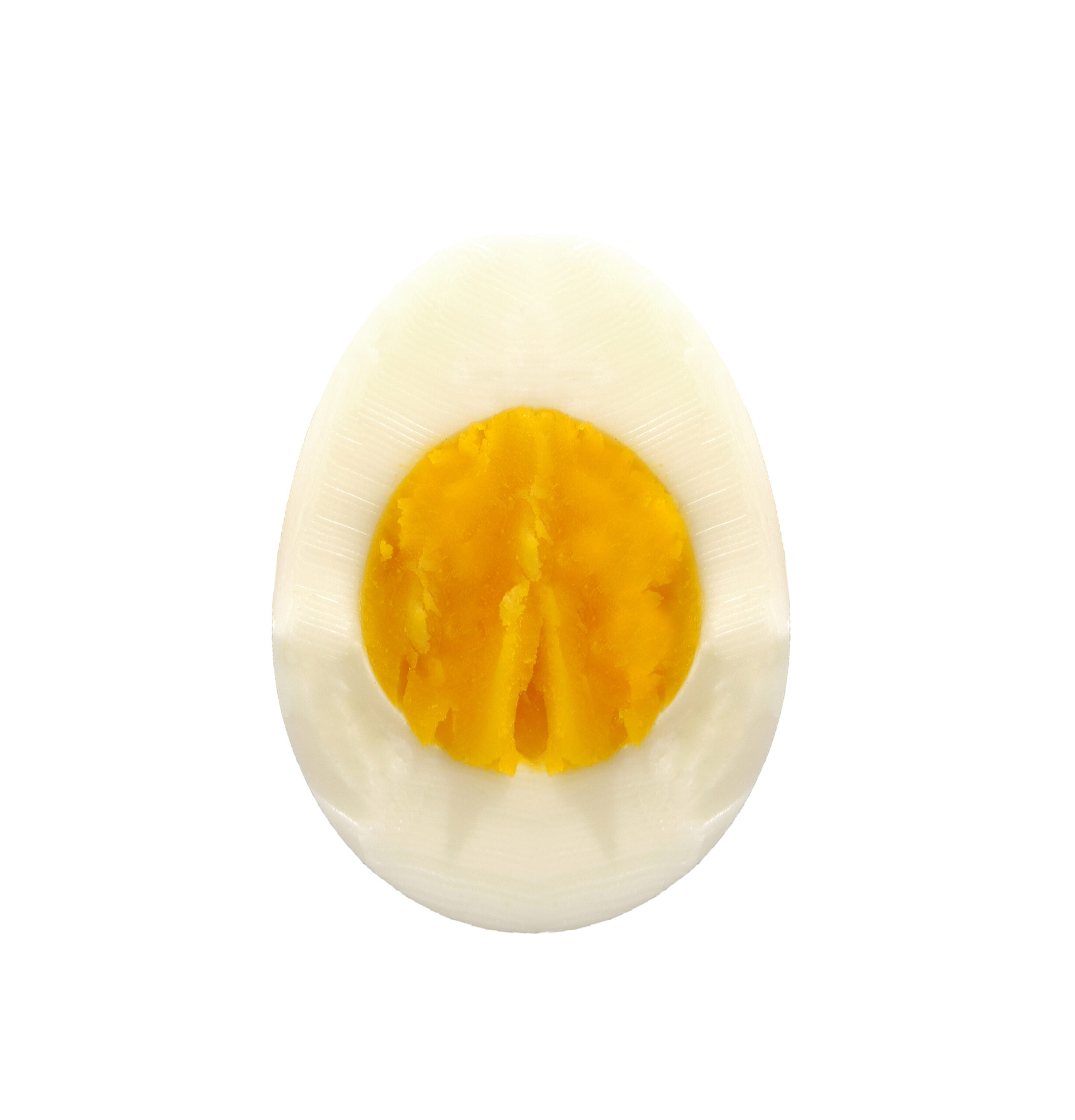 Sliced hard boiled egg on white background