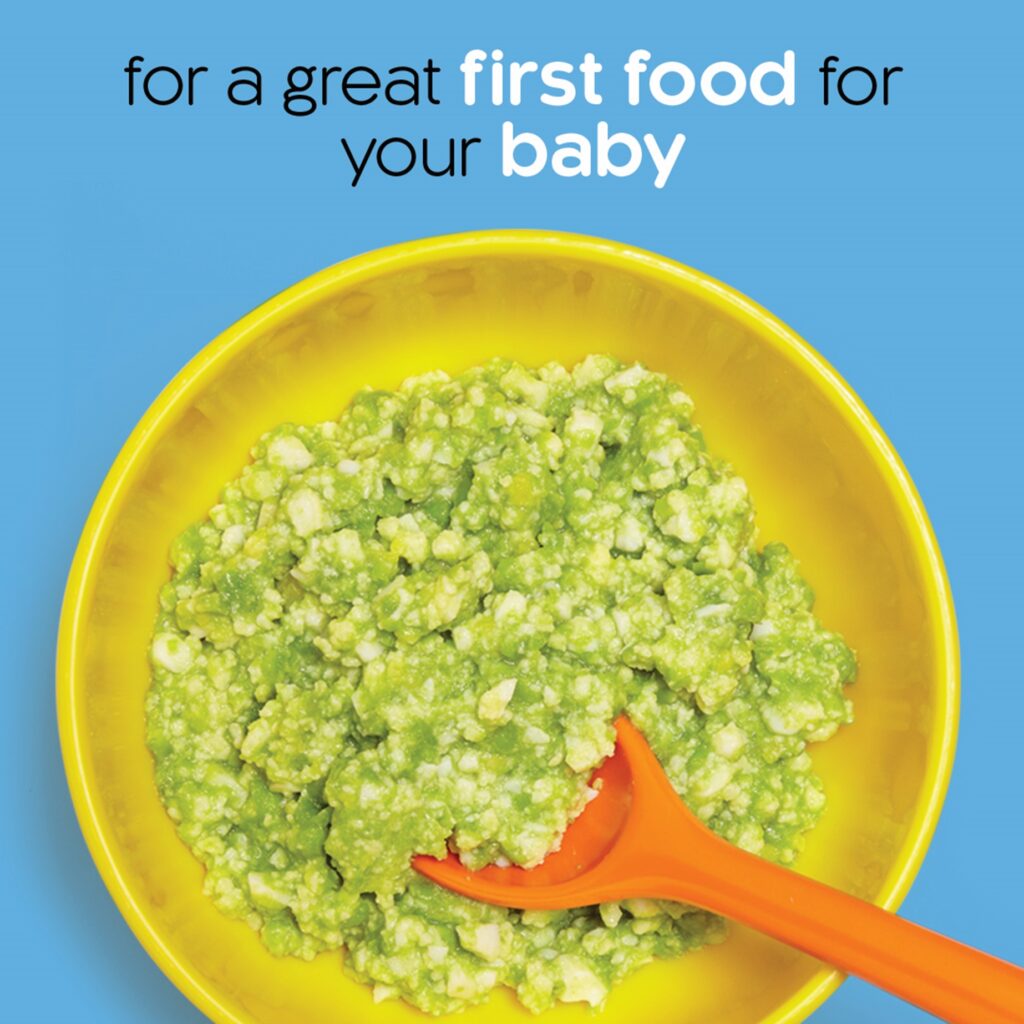 Baby's first green vegetable puree in yellow bowl