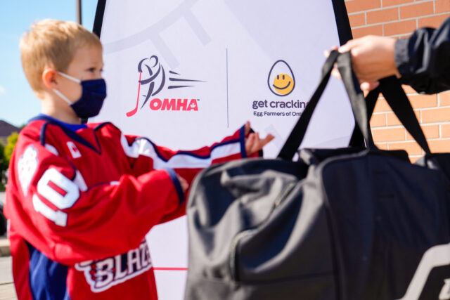 Young hockey player at an Ontario Minor Hockey Association and Get Cracking event